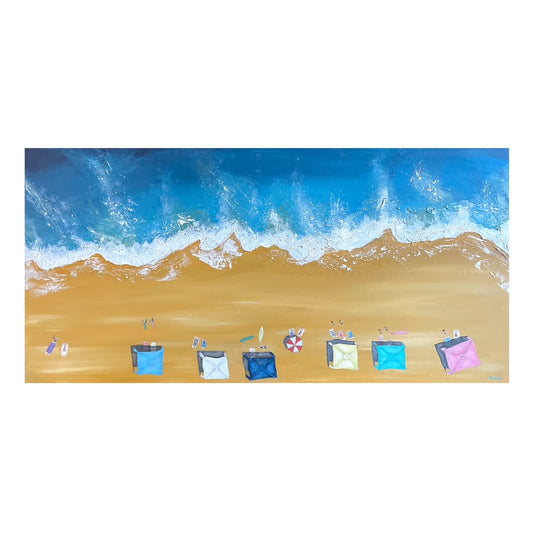Beach scene with colorful beach bags and towels on sand and surf.